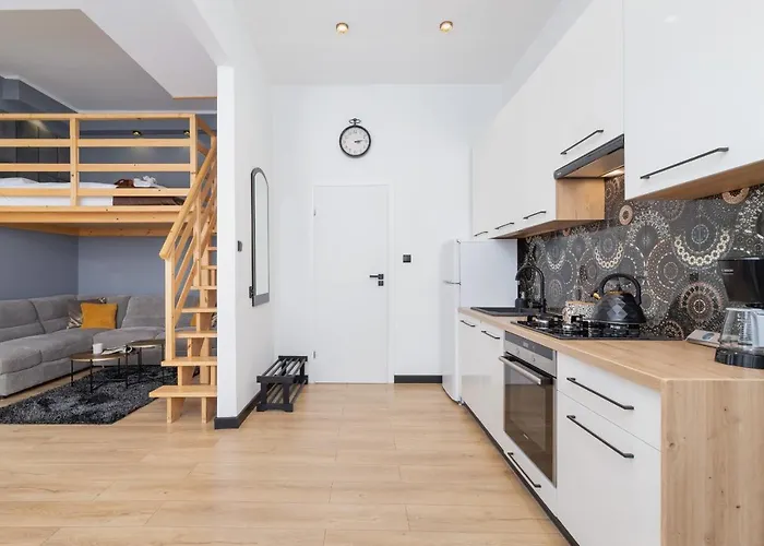 Ariańska Studio with Mezzanine Cracow Center by Renters